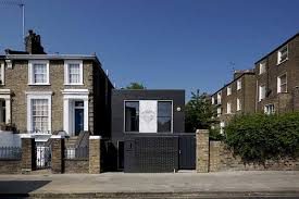 What will the stamp duty break do to prices? Award Winning Small House In London With A Dark Brick Exterior