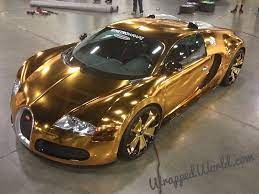 The extremely rare convertible veyron grand sport, with only 150 ever made, originally started off with a white paint scheme but was sent to dubai for a makeover. Meet Flo Rida S Gold Chrome Bugatti Veyron