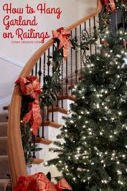 How To Hang Garland On Staircase Banisters Oh My Creative