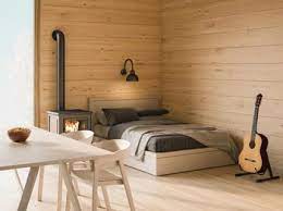Selain memberikan kehangatan, material elemen kayu juga memilik nilai estetik sendiri. 7 Inspirasi Desain Kamar Rumah Minimalis Bertema Kayu Foto 1