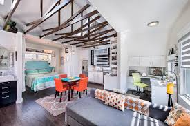 Ikea's kallax is perfect for holding boxes, bins, baskets, and books, but one diyer saw its potential as an understated entertainment unit—and the results are inspiring. 5 Ways To Fake A Bedroom In A Studio Apartment