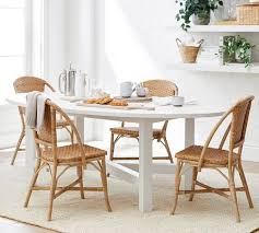 If your dining room chairs have arms, you might want to leave a few extra inches of space to be safe as arms can take up more room around. Parisian Woven Dining Chair Pottery Barn