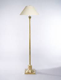 An openwork, wire frame encircles the white fabric shade to create a breezy tiered design. Eight Of The Best Floor Lamps To Bring Light Into Your Living Spaces Country Life