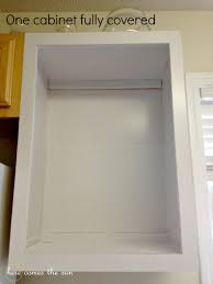 The most dramatic portion of that makeover was updating the kitchen by using white contact paper on the cabinets and drawer fronts: Kitchen Cabinet Contact Paper Update Kelly Leigh Creates