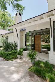 Black And White Combination House Lake Austin Residence Bullock Mcintyre Studio House Exterior Contemporary Front Doors Farmhouse Exterior