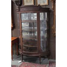 Check spelling or type a new query. China Cabinet Oak Having A Foliate Carved Crest Curved Glass Door And Sides And Resting On Shaped