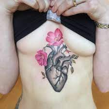 Black heart tattoo with flowers. Anatomy Tattoos Heart Flower Tattoo Anatomical Heart Tattoo Anatomy Tattoo