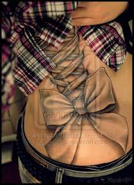 Look at how amazing this cross tattoo looks. Criss Cross Bow And Ribbon Tattoo Corset Tattoo Lace Bow Tattoos Bow Tattoo