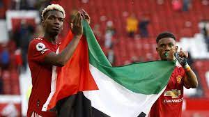 Ole gunnar solskjaer says he respects paul pogba and amad's decision to carry a palestinian flag during manchester united's lap of honour. Manchester United S Paul Pogba And Amad Diallo Raise Palestine Flag After Premier League Draw With Fulham Football News Sky Sports