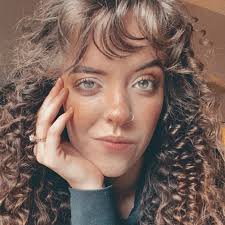 High stilt walker in Boston traffic. ANET Ta SNDA 2の主E COSTON LOSTONPOLICE  POLICE DEPT-