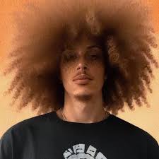 NBA rule: players are allowed two steps after "gathering" the ball  (stopping their dribble or catching it while moving) to pass, shoot, or  start a new dribble. The two steps can be