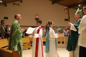 A church full of parishioners braved today's wind and rain to witness  Bishop Dennis Sullivan formally install Msgr. Peter Joyce as pastor of  Saint Charles Borromeo Church in Sicklerville earlier today. Msgr.