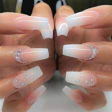 With a vision in mind to save valuable time and to give better results than a traditional manicure, we launched empress nails a collection of luxury press on nails. White And Pink Ombre Nails With Diamonds Novocom Top
