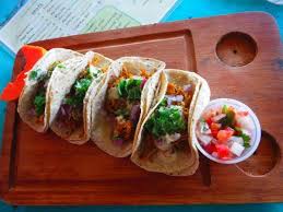 Other popular items include fish, chicken or beans panades, garnaches, tostadas, tacos, and salbutes. Best Fish Tacos I Ve Ever Had Review Of Wet Lizard Belize City Belize Tripadvisor