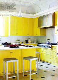 A Kitchen Makeover Yellow Or Aqua Coco Kelley Yellow Kitchen Cabinets Yellow Kitchen Kitchen Design