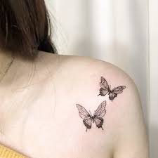 Beautiful And Meaningful Butterfly Tattoo Guide Small Shoulder Tattoos Butterfly Tattoo Designs Neck Tattoo