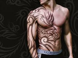 A tattoo of an eagle warrior is worn in modern times as a symbol of ancient aztec races. Tribal Warrior Arm Tattoos Arm Tattoo Sites