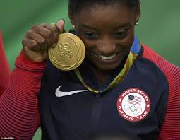 Simone Biles and Team USA gymnasts take center stage as final begins in Rio 