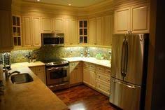 The wall that carves out the breakfast nook is a paint shade called soft sky by benjamin moore. Kitchen Layout