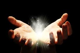 Female hands reaching up with bright white shaft of light between on a pink and blue background with a healing hands word cloud on. Speculative Faith Energy Healing Hands
