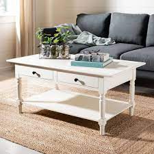 Finished wood, brass, glass, acrylics & more. Safavieh Boris 42 In Cream Large Rectangle Wood Coffee Table With Drawers Amh5706c The Home Depot