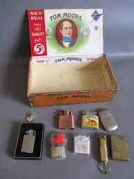 See more ideas about tom moore, glass artists, glass art. Cigar Box With Butane Lighters Folding Knives And More Estate Sale Everything Must Go K Bid