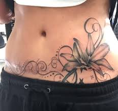 Tummy tuck surgery doesn't have any effect on the skin above the belly button, so if you're trying to conceal a stretch mark in the mid abdomen/stomach area a single belly tattoo is a popular strategy. Pin On Tattoos