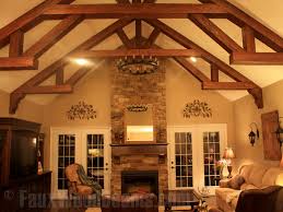The beams cross section the kitchen s vaulted ceiling with a skylight in between each pair. 15 Faux Wood Ceiling Beam Ideas Photos Home Stratosphere