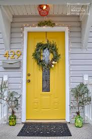 Modern architecture uses concrete where appropriate and then exposes it. I Wish It Were Practical To Paint The Door As The Seasons Change This Is A Christmas Door But I Would Tota Exterior Paint Colors For House Doors Yellow Doors