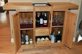 The magnet lock in this liquor cabinet was made using 2 circular magnets from princess auto. Liquor Cabinet In White Oak Finewoodworking