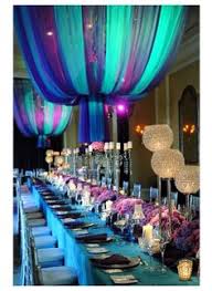 A gilded table would be proud to have these bronzed carved peacock feather themed candle: 17 Peacock Theme Party Ideas Peacock Theme Peacock Party Peacock