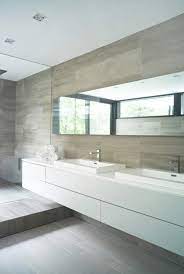 The fresh flowers definitely make the room here. 81 Calm And Beautiful Neutral Bathroom Designs Digsdigs