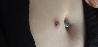 Is It Normal For A Belly Button Piercing This Is About A Week Old To Have The Top Par Of The Jewelry Be Slightly Embedded Into My Skin Piercing