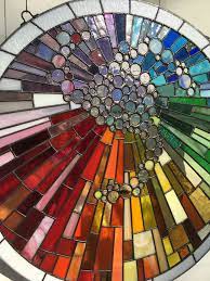 Utilized as windows or roofs, the works, which are developed of hued glass pieces associated and illustrated by portions of lead, are every now and again found in strict structures. Round Stained Glass Panel Made By The Rusty Pickle Stained Glass Panels Stained Glass Diy Stained Glass