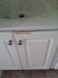 How To Fix Peeling White Cabinets Laminate Cabinets Cabinet Repair Refacing Kitchen Cabinets