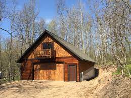 He constructed the 10' x 16' loft cabin with the help of his family. 30x36 Garage And Bunkroom Carriage House Plans Garage Design Camp House