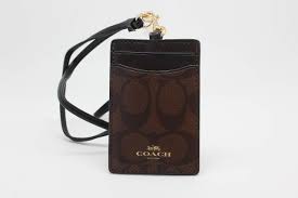 Sleek designs still offer roomy compartments for organizing your daily. Amazon Com Coach Signature C Brown Black Lanyard Badge Id Credit Card Holder 63274 Office Products