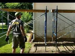 Carefully lift the cross braces and secure on the bottom of the opposite end piece. How To Set Up Scaffolding Solo Youtube