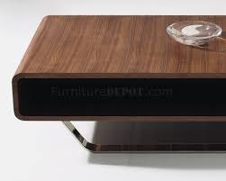 This coffee table is both cleverly functional, and simply appealing. 136a Coffee Table In Walnut By J M W Chrome Legs