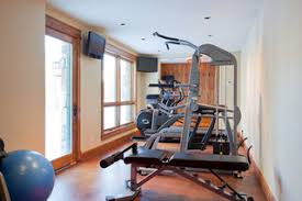 A toaster, an oven and a washing machine along with a heating system, a private balcony and a. Autumn Ridge Telluride Co Rustic Home Gym Denver By Gies Architects Houzz