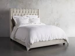 Sold by ami ventures inc. Devereaux Tufted Bed Arhaus