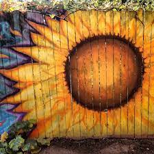 This fence idea is the ultimate barn, farm type design that is good for the out backs like in the backyard along decks and in the they are very common fence ideas for suburban homes. Fence Art 25 Pieces Of Art Using A Backyard Fence As The Canvas 100 Things 2 Do