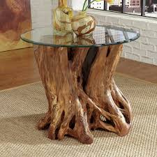 Live edges give it a rustic look, while the top is polished to provide a smooth surface for snacks and drinks. Tree Stump Coffee Table You Ll Love In 2021 Visualhunt