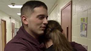 Belmont girl surprised by reunion with Marine brother