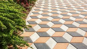 Clear the area, line the edges with cement pavers, put the wood slices in position, and finally fill the space with soil. Walkway Ideas For Your Yard And Garden Reviewed