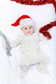 See beautiful baby boy stock video clips. Beautiful Baby Boy In Christmas Hat And Stock Image Colourbox