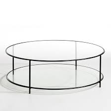 Glass round coffee tables should always look refreshing, unique and elegant, as that is where you would sit for a fresh cup of coffee and feel rejuvenated. Sybil Two Tier Round Coffee Table In Tempered Glass Black Am Pm La Redoute