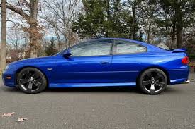 Image result for Dark Ming Blue 2004 Pontiac