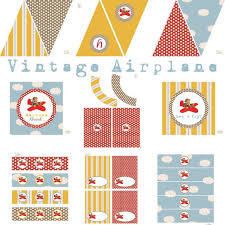 A gorgeous framed aged map and bunting gave styling and color to the dessert table with added dimension from the suitcases and books. Vintage Airplane Party Decor Next Day Turn Around Available Printable Birthday P Vintage Airplane Party Airplane Birthday Party Airplane Party Decorations
