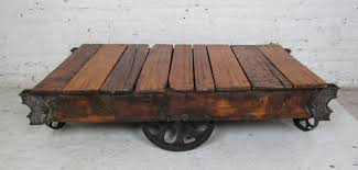 You may still purchase a cart however we are only selling fully refinished carts at this time. Vintage Industrial Railroad Cart Coffee Table For Sale At 1stdibs